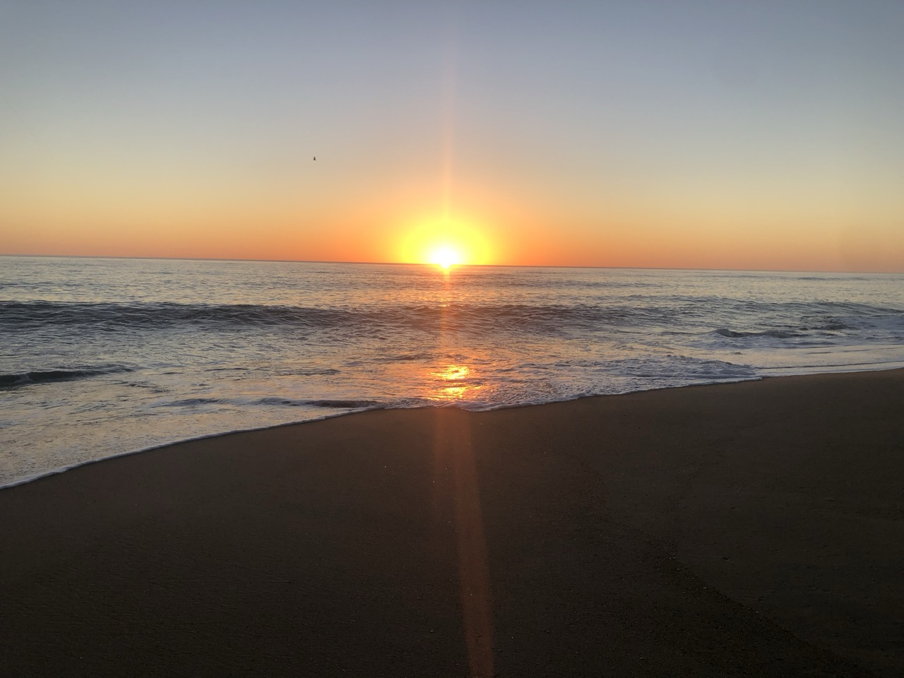 Sunrise over the Atlantic at Kitty Hawk beach, Outer Banks