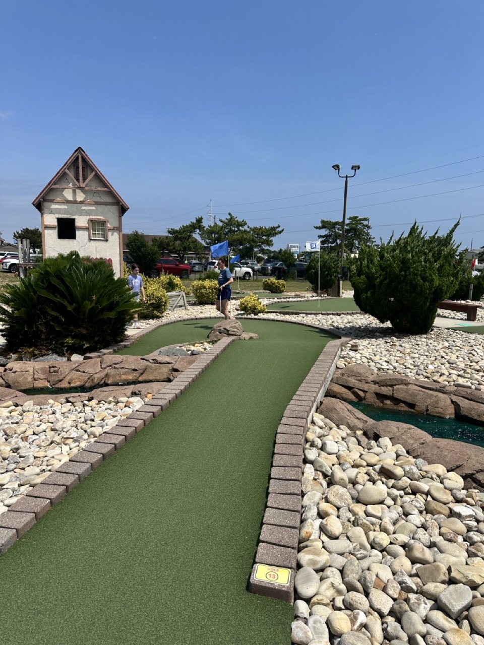 A family playing mini golf near Kitty Hawk, Outer Banks