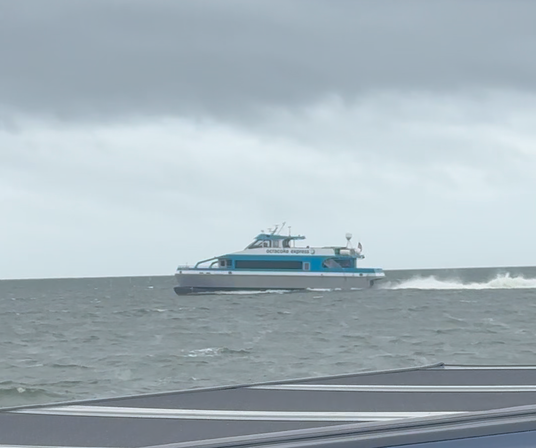 The Ocracoke Express passenger ferry crossing Hatteras Inlet