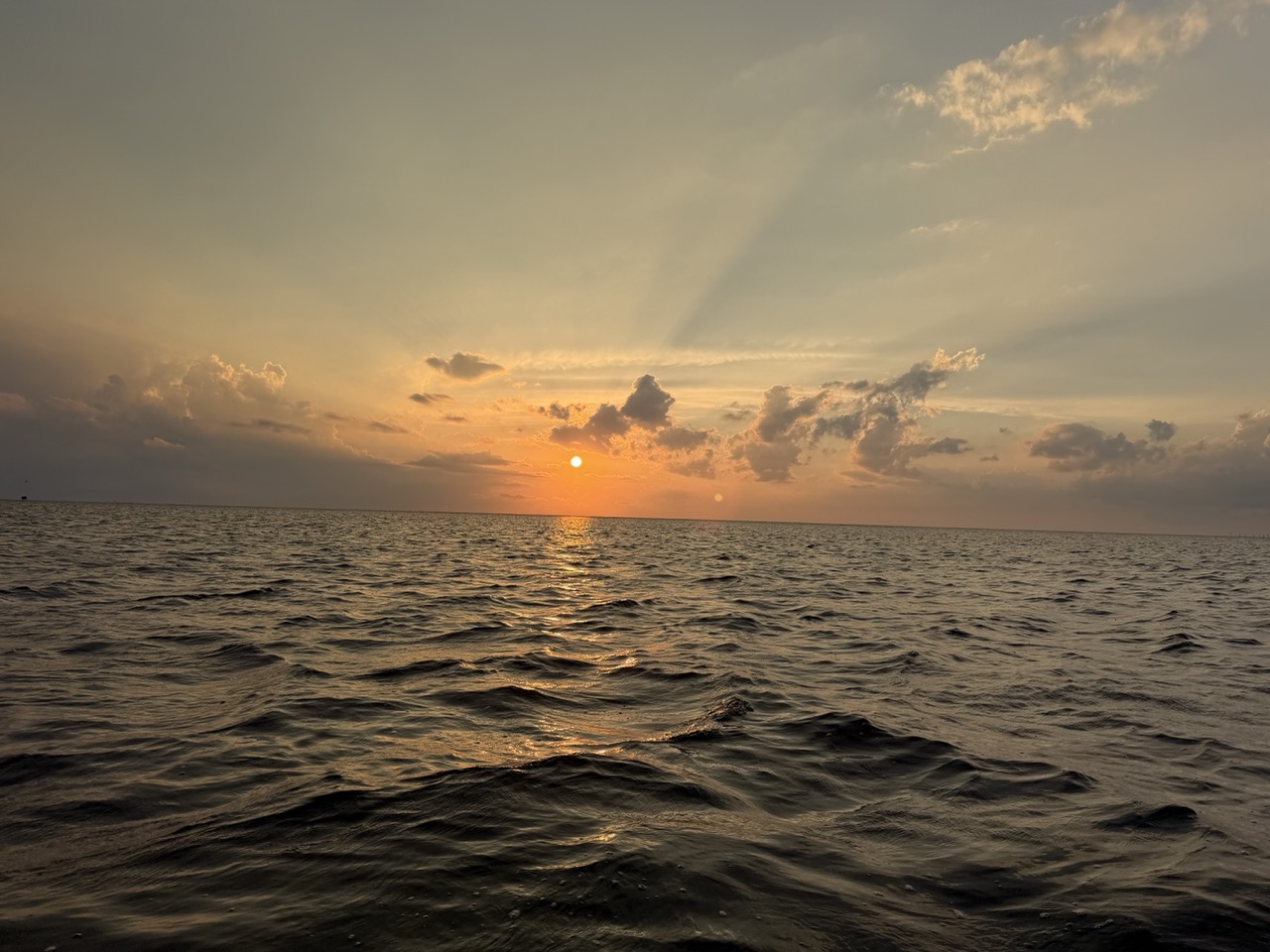 Sunset over the Pamlico Sound seen from a boat near Avon, NC