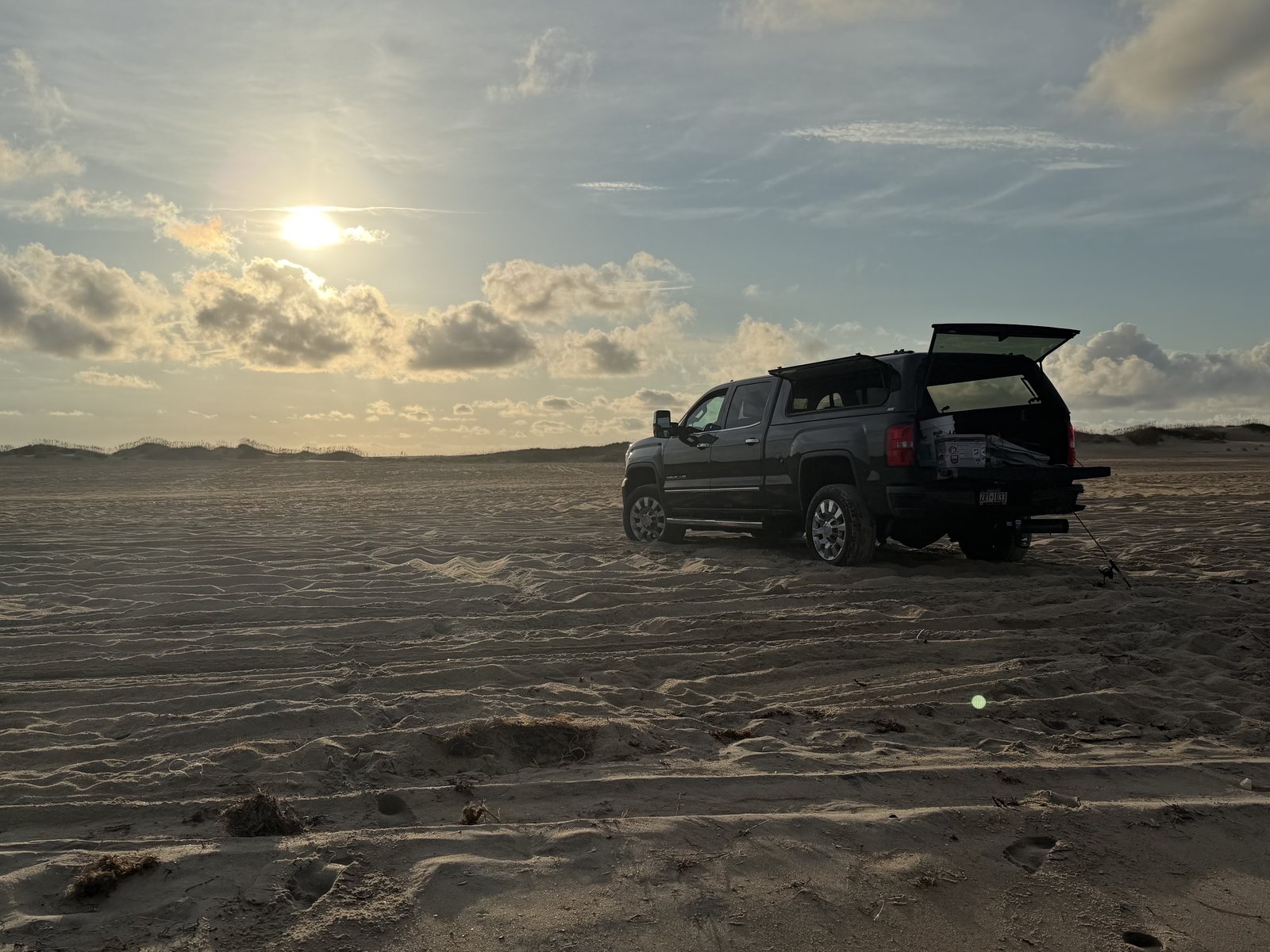 Driving the 4x4 out on the Avon beach at sunrise